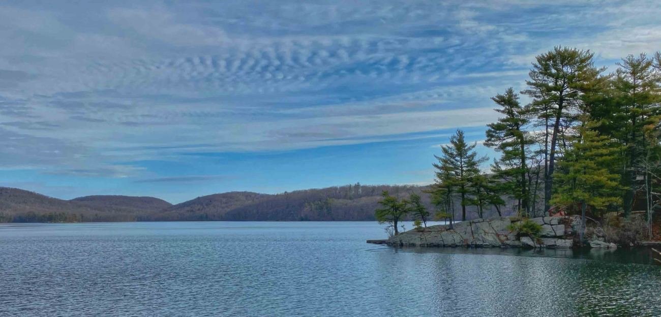 A lake framed by forested hills in Sterling Forest