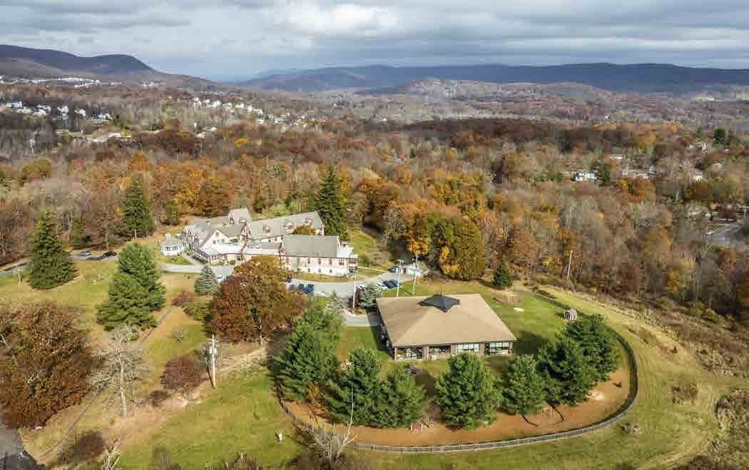Aerial view of Thevenet Montessori’s wooded campus